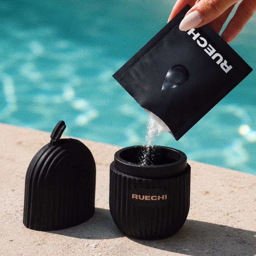 Person pouring a RUECHI product into a container by a pool